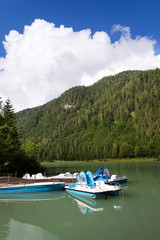 Fototapeta na wymiar Pedal boats on Lake Pillersee, Sankt Ulrich am Pillersee, Austria