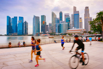 People running and cycling Singapore