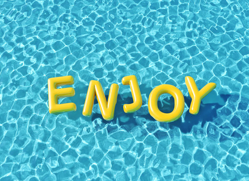 Clear blue swimming pool with enjoy word floating on the water