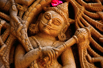 Carved idol on the outer wall, Hatkeshwar Mahadev, 17th century temple, the family deity of Nagar...