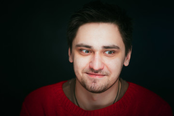 Obraz premium emotional young man photo in studio
