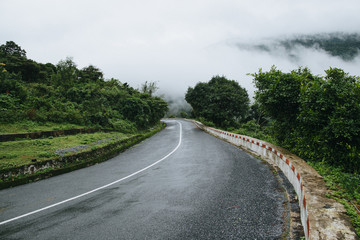 empty asphalt road in beautiful mountains, Hai Van Pass, Vietnam