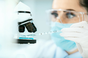 Medical Analysis. Female Scientist Doing Test In Laboratory © puhhha