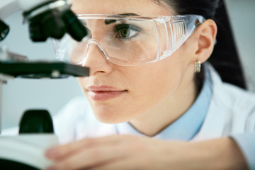 Medical Analysis. Female Scientist Doing Test In Laboratory