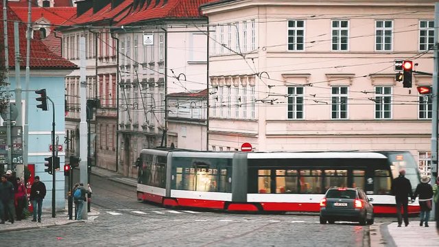 Prague, Czech Republic. Modern Tram Moving On Letenska Street. Evening Traffic In Czech Capital