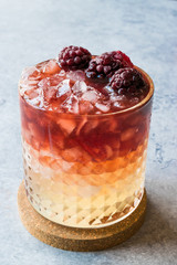 Bramble Cocktail with Blackberries and Crushed Ice.