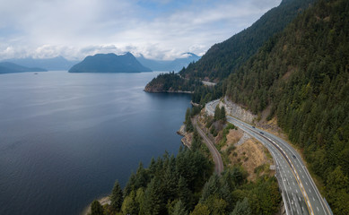 Fototapeta na wymiar Aerial drone panoramic view of Sea to Sky Highway during a bright summer day. Taken North of Vancouver, British Columbia, Canada.