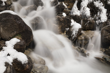 Long exposure of a creek in the Meiental in the Alps in central Switzerland