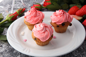 Delicious cupcake for Valentine Day. cake for Valentines day with chocolate and strawberries. Traditional homemade with red roses