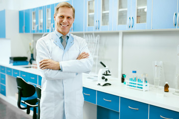 Male Scientist In Laboratory Portrait