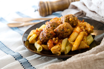 tasty penne with Meat ball and tomato sauce