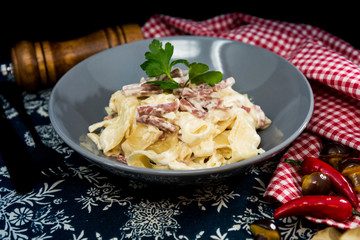 tasty Carbonara pasta on the table