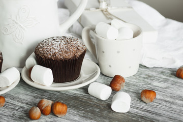 Teapot, cupcake and different decorations