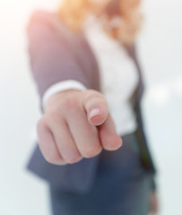 Fototapeta premium Young Woman pointing finger to You