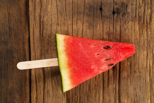 Fresh watermelon on a wooden background, Food top view