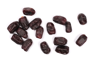 Pile dry dates isolated on white background, sweet fruit, top view