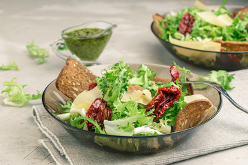 Frisee lettuce salad with sun dried tomatoes