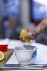 man hands squeeze citrus