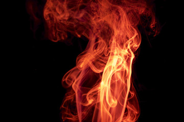 Red smoke on black background