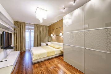 Modern interior of a bedroom in the new house.