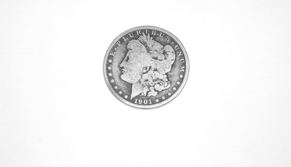 Rare morgan 1901 silver dollar coin for sale indoors.