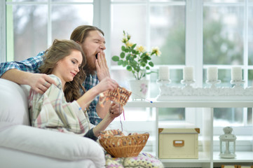 Happy smiling  woman with man   knitting 