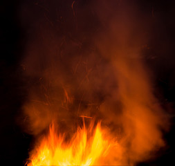 fire with smoke on a black background