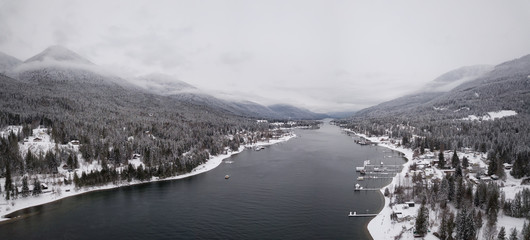 Aerial panoramic view of Winter Canadian Landscape. Taken in Balfour, near Nelson, Kootenay, British Columbia, Canada.