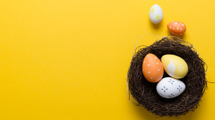 Happy easter decoration background, eggs in the nest