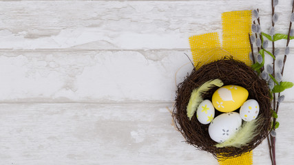 Happy easter decoration background, eggs in the nest