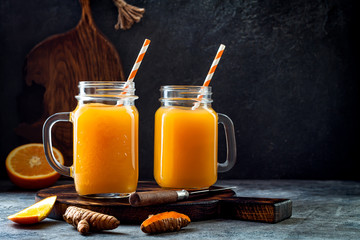 Immune boosting, anti inflammatory smoothie with orange, pineapple, turmeric. Detox morning juice...