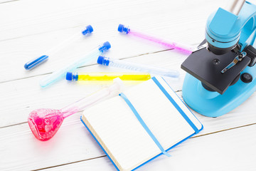 Chemistry class makes chemistry experiment. STEM. Robotics, mechanic, chemistry, biology. Modern education. Fun and interesting White boards background