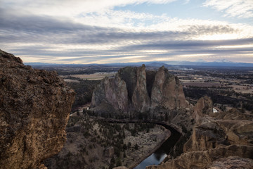 Striking landscape of the famous location, Smith Rock, during a winter cloudy evening. Taken in Oregon, United States of America.
