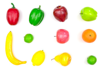 Fake fruit on a white wall