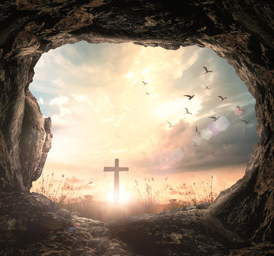 Resurrection of Easter Sunday concept: Empty tomb with cross symbol for Jesus Christ is risen