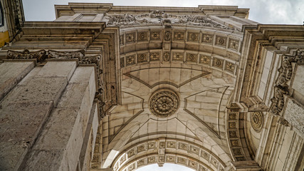 Looking up at Arc Augusta, Arc de Triomphe, Lisbon, Portugal. Lisbon is continental Europe's...
