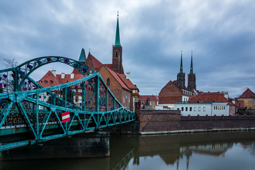 Tumski bridge and Holy Cross church in Wroclaw, Silesia, Poland