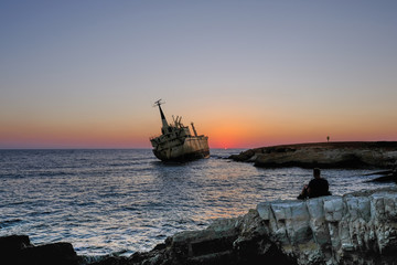 Sunset at shipwreck in Pafos, Cyprus
