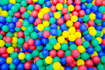Colored plastic balls. Background. Texture