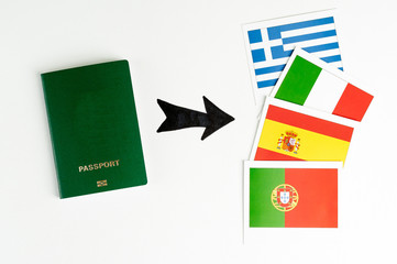 Clean green passport  and several cards with prapors of the world. Says on a white background. Isolate.