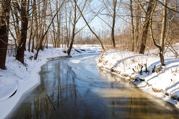 Winter landscape by a river