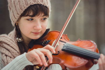 Teenage girl portrait with violin 