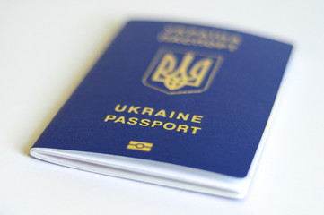 blue Ukrainian passport on a white background, isolate