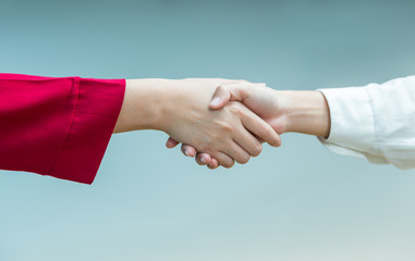 Two women's handshake