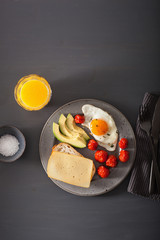 fried egg, avocado, tomato for healthy breakfast