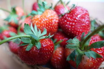 A Ripe strawberries  in the basket, red fruit, plant in countryside farm, feel fresh and sweet, fruit macro photography concept