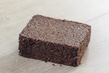 Stack of rye bread on wooden background table