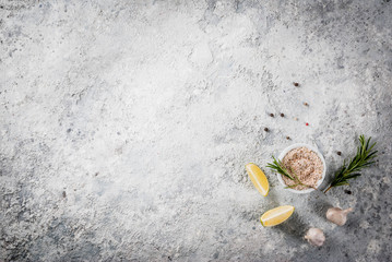 Food cooking ingredient, herbs and spices, grey stone background top view copy space