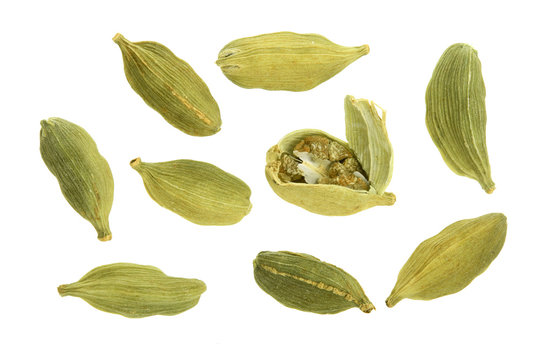 Green cardamom seeds isolated on white background. Top view. lay flat