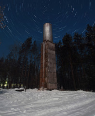 Fototapeta premium Night landscape and starry sky, star trails,